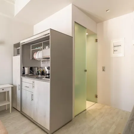 Elenitas Flat Next To The Windmills